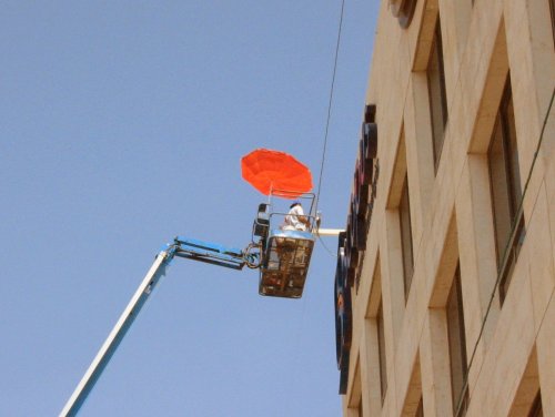 Installing Overhead Cable on Building